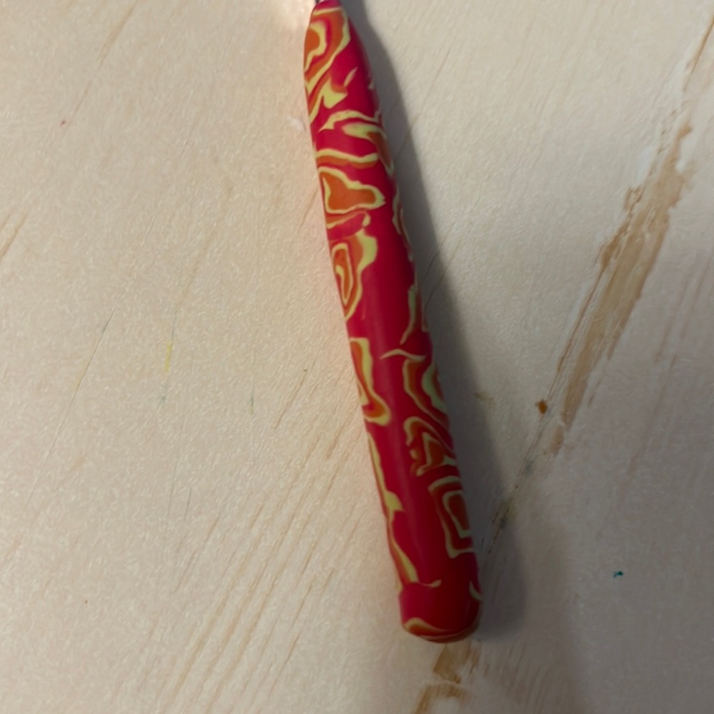 Crochet hook with handmade clay handle